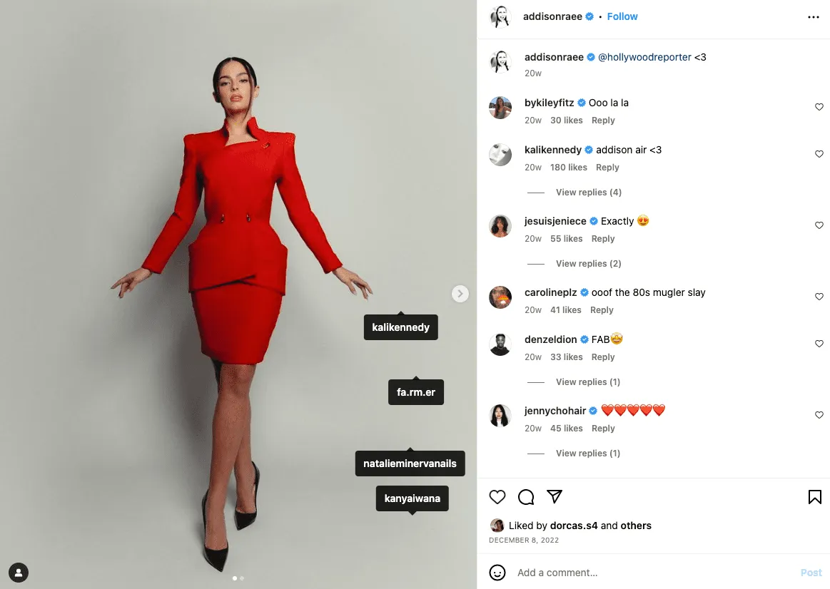 Instagram post of a creator in a red dress with shoppable product tags overlaid